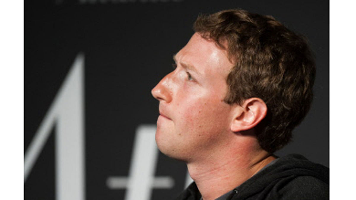 In this file photo taken on September 18, 2013 Facebook Founder and CEO Mark Zuckerberg speaks during an interview session with The Atlantic at the Newseum in Washington, DC.