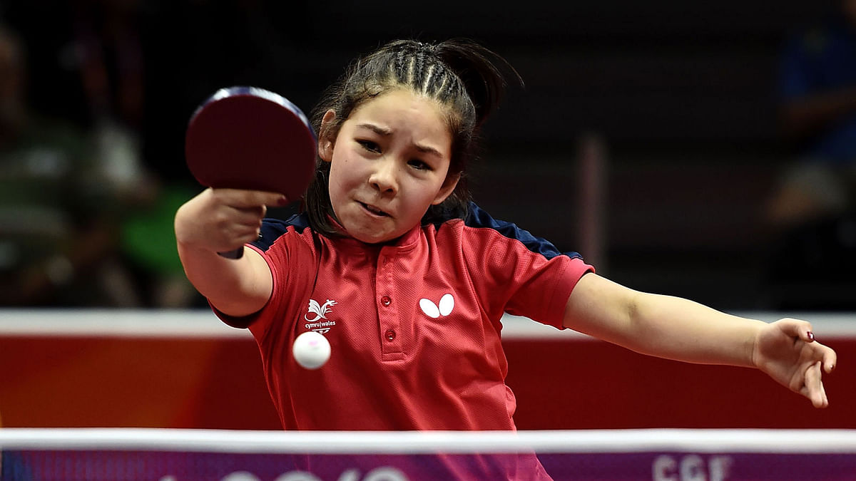 Wales`s Anna Hursey hits a return against Malaysia`s Li Sian Alice Chang during their women`s singles table tennis game at the 2018 Gold Coast Commonwealth Games at the Oxenford Studios venue in Gold Coast on 10 April, 2018. Photo: AFP