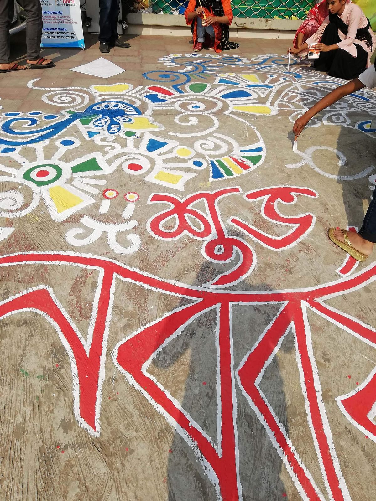 Students of Green University of Bangladesh paint alpona (motif) on their campus as a preparation to welcome Pahela Baishakh, the first day of Bengali New Year. Photo: Collected