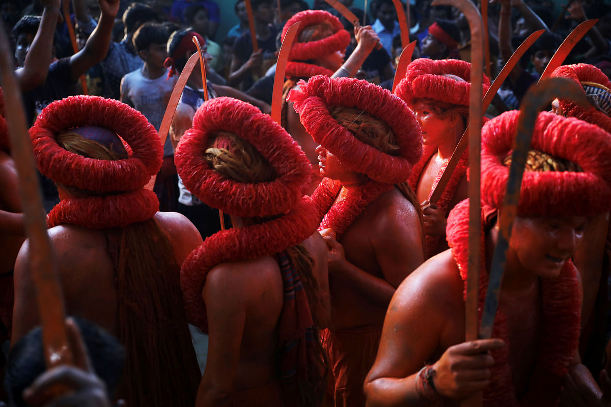 Hindu devotees dance as they celebrate Lal Kach festival in Narayanganj, 13 April 2018. Reuters