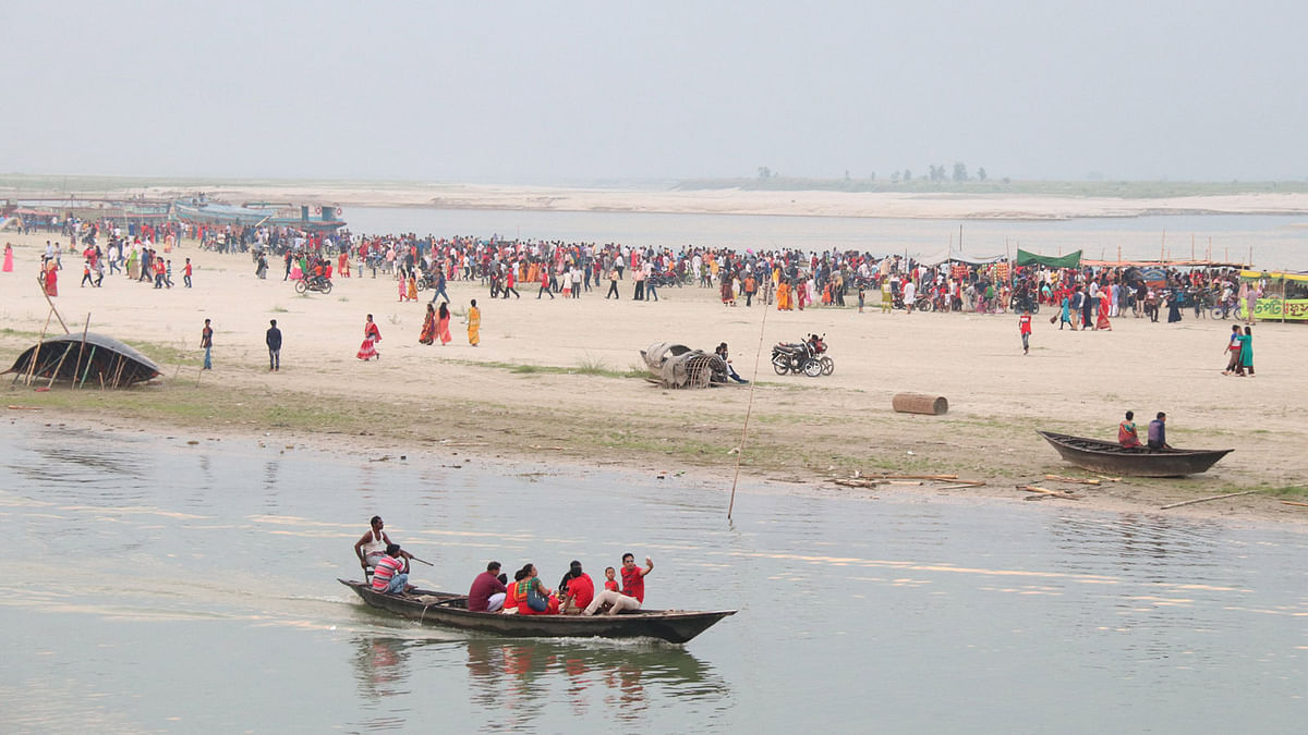 People have fun on Pahela Baishakh, boating on the river Padma, 14 April, Faridpur sadar upazila. Photo: Alimuzzaman