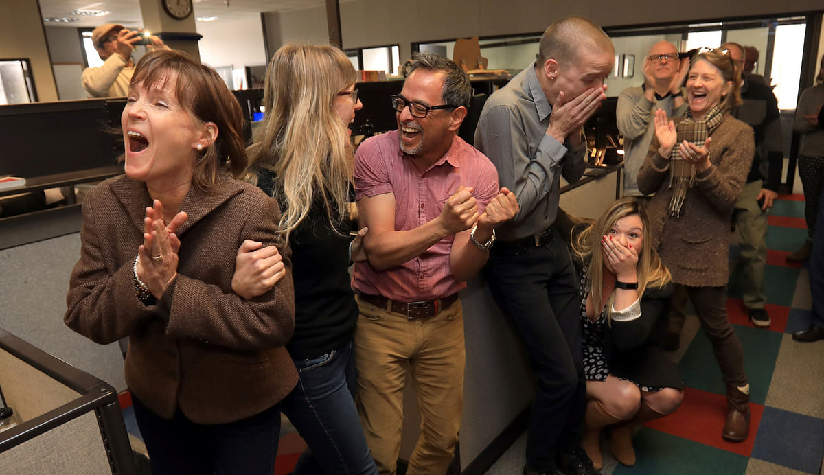 The staff of the Press Democrat celebrate winning the Pulitzer Prize for Breaking News Reporting in Santa Rosa. Reuters