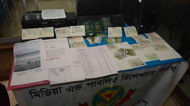 Police arrests four people involved in counterfeit visa making for Shengen countries from city`s Uttara area on Monday. Picture: DMP