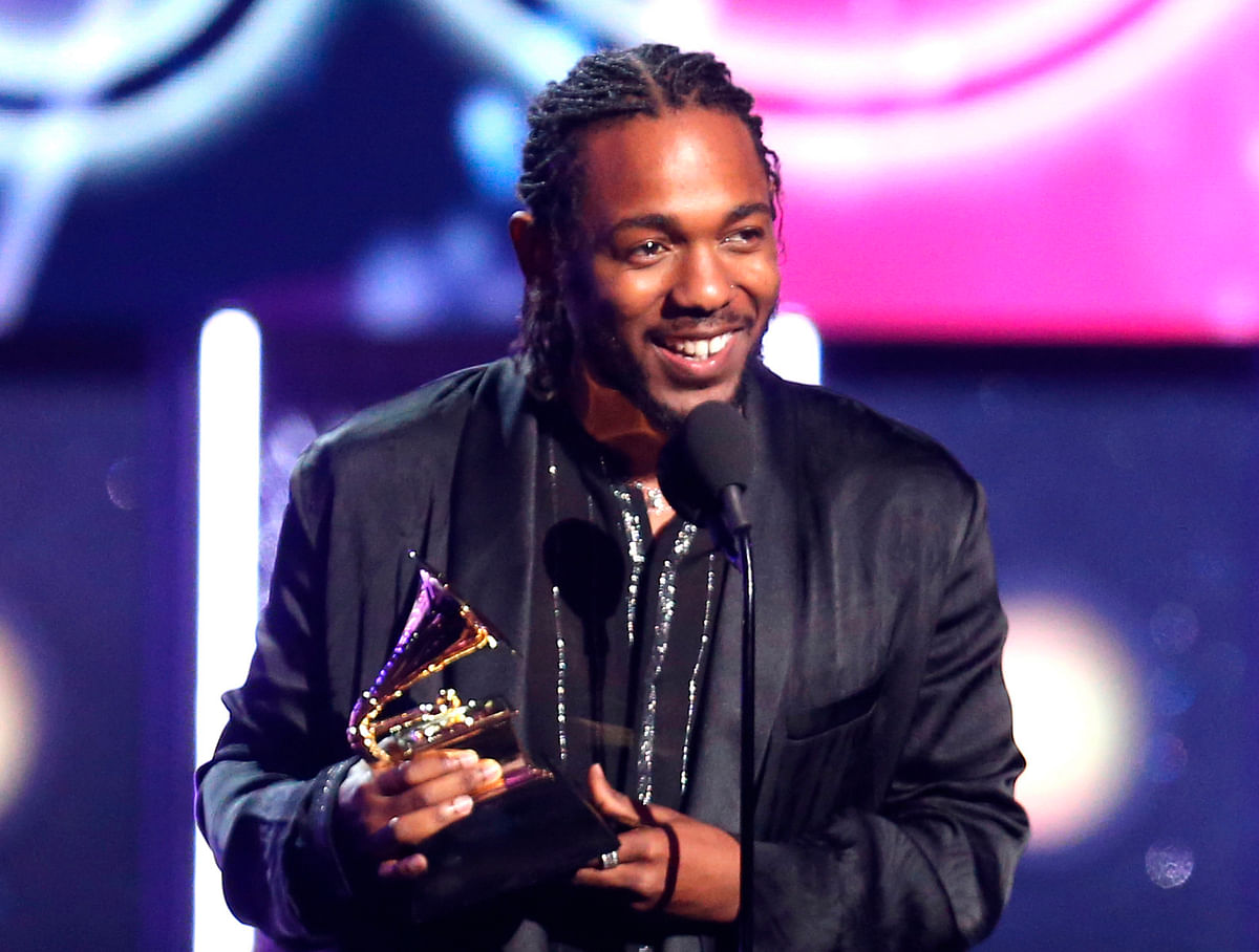 Rapper Kendrick Lamar accepts the award for best rap album for `Damn` at the 60th annual Grammy Awards in New York on 28 January. Photo: AP