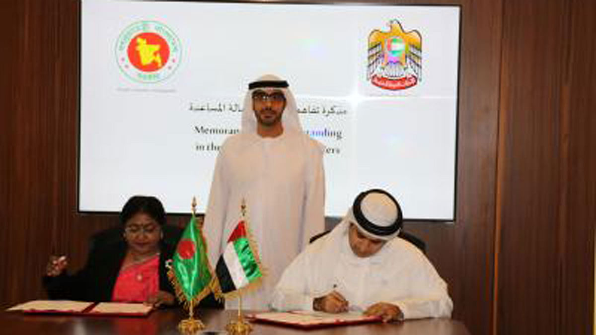 Expatriates welfare and overseas employment ministry secretary Namita Halder and the UAE’s human resources and Emiratisation ministry under-secretary Saif Ahmed Al Suwaidi sign the MoU on behalf of their respective sides in Dubai. Photo: BSS