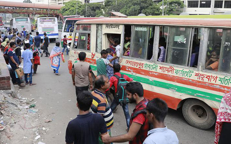 Buses stop randomly to drop and pick up passengers at Shahbagh.