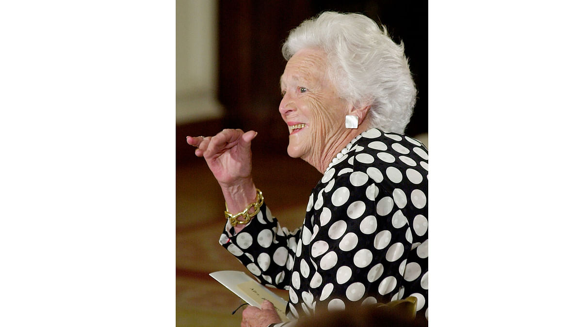 In this file photo taken on 3 June 2002 former US first lady Barbara Bush waves to a participant at the White House Conference on School Libraries attended by first lady Laura Bush in the East Room in Washington DC. Photo: AFP