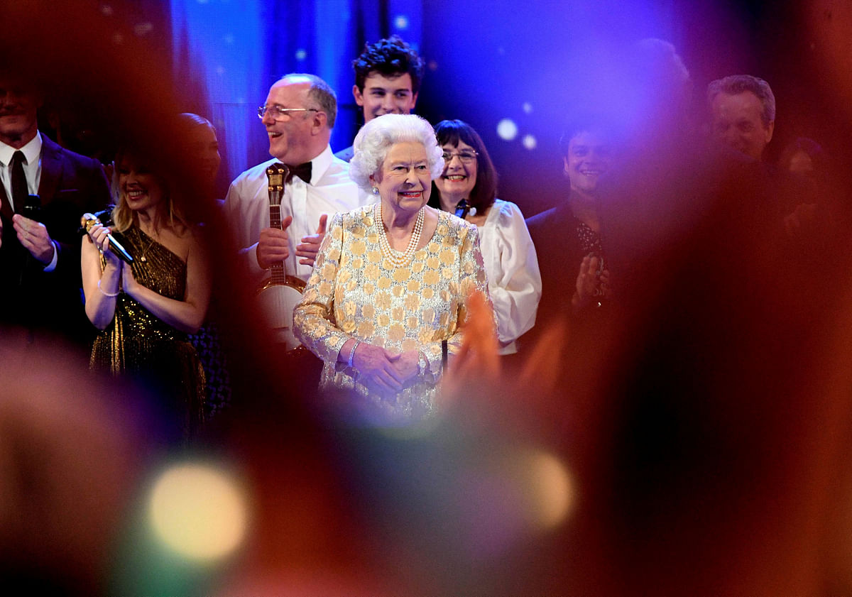 Britain`s Queen Elizabeth smiles on stage during a special concert `The Queen`s Birthday Party` to celebrate her 92nd birthday at the Royal Albert Hall in London, Britain on 21 April 2018. Reuters