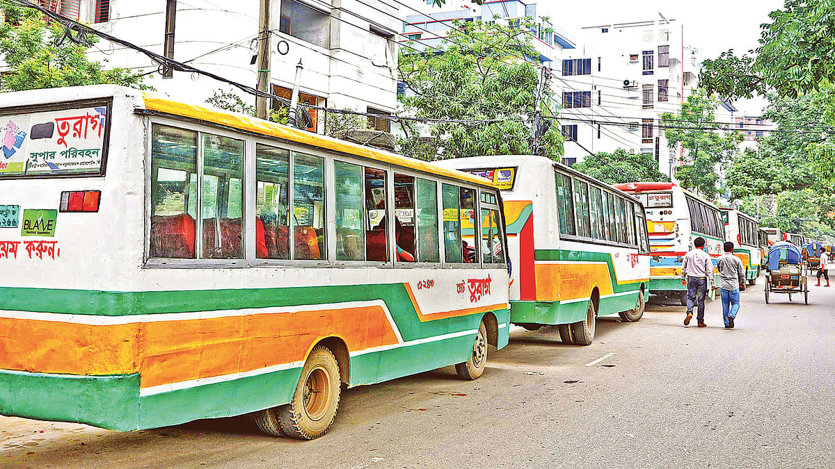 As many as 35 buses of Turag Paribahan seen lined up in front of Kuwait Bangladesh Friendship Government Hospital on Monday as part of Uttara University students` protest against sexually harassing a female student in a running bus. Photo: Prothom Alo