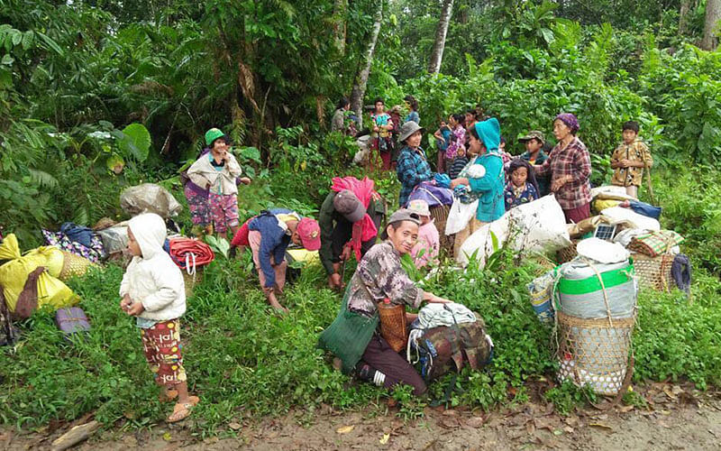 The photo shows Kachin civilians, displaced by fighting between the Myanmar military and Kachin guerrillas, take shelter in a jungle close to Tanai, northern Kachin state, Myanmar on 19 April 2018. AP