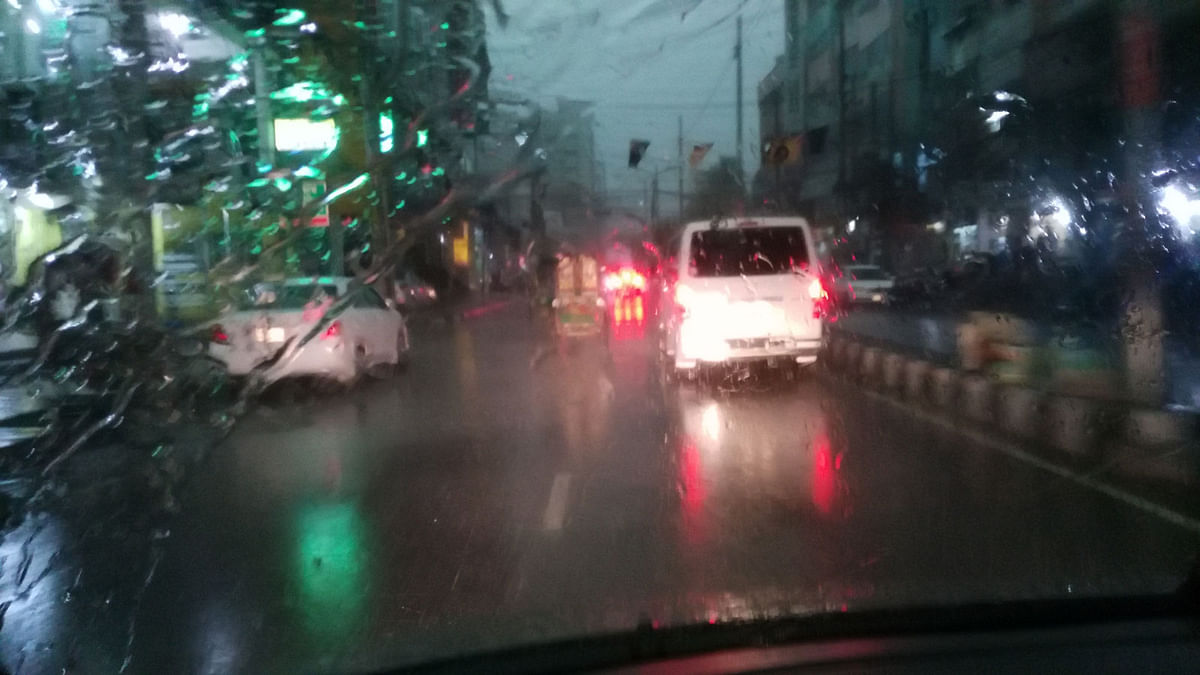 Even the wiper is tired of wiping rain waters. Heavy rains with storm sweep over the capital on Monday noon. Photo: Khawaza Main Uddin