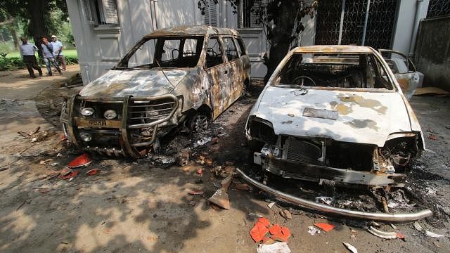 Prothom Alo File Photo: A group of people during a protest demanding reforms in the quota system in public service set fire to two vehicles parked inside DU VC`s residence.