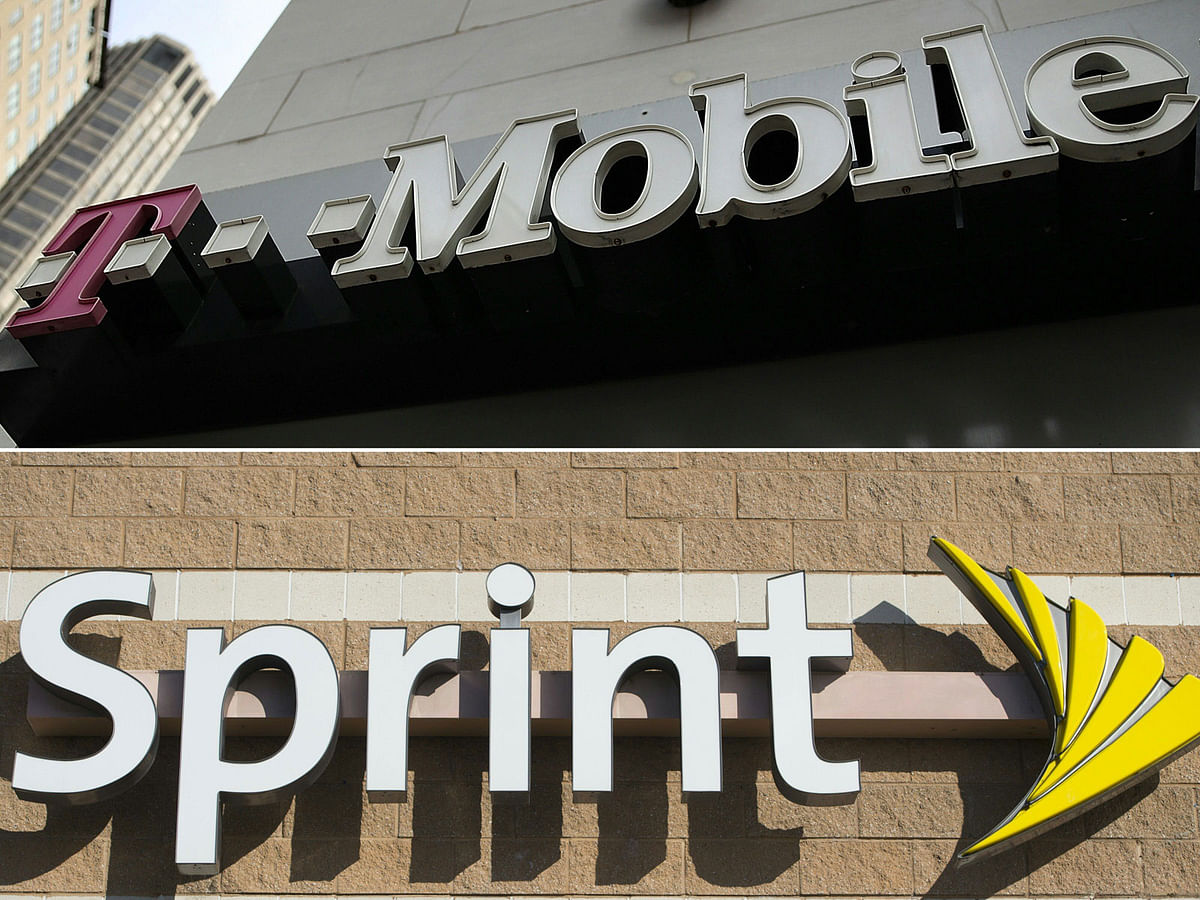 The T-Mobile logo and a Sprint cell phone company logo. AFP file photo
