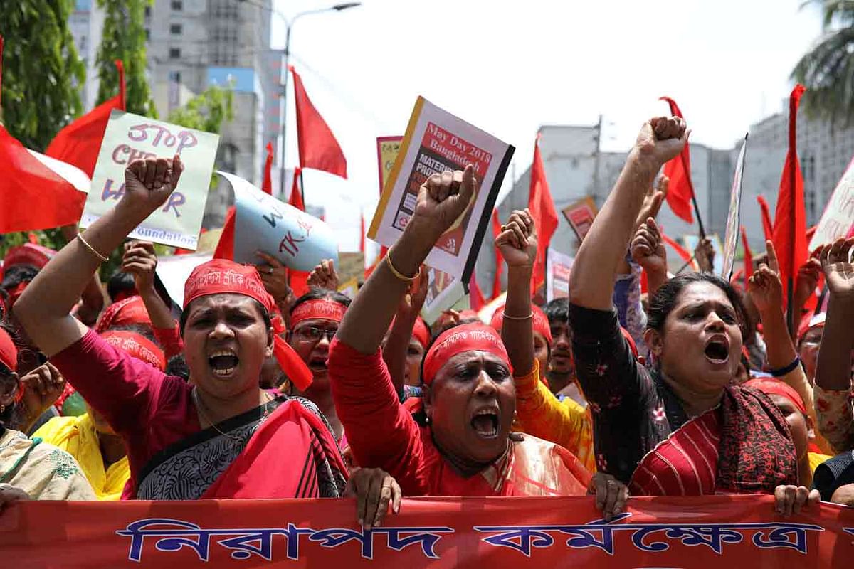 Women shout slogans as they participate in a May Day rally in Dhaka, Bangladesh, 1 May. Photo: Reuters