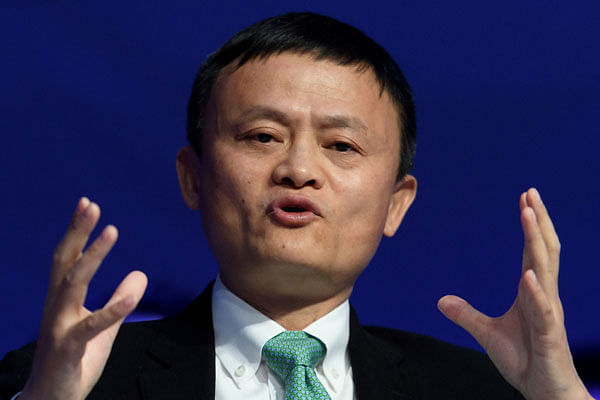 In this file photo taken on 18 January, 2017 Alibaba Group founder and executive chairman Jack Ma speaks during a panel session on the second day of the World Economic Forum in Davos. Photo: AFP