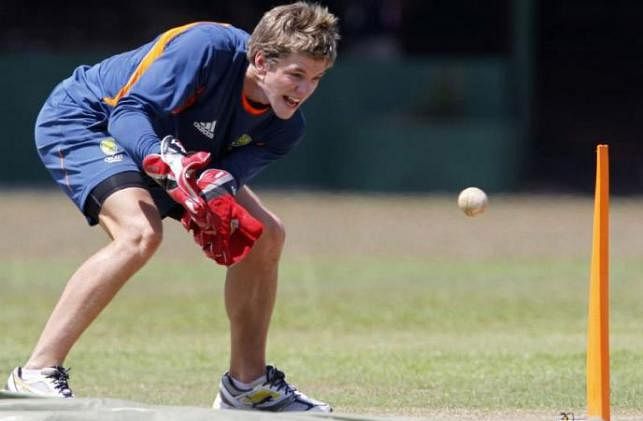 Australia wicket keeper Tim Paine catches a ball during a practice session before a Cricket World Cup match against Sri Lanka in Colombo on 2 March 2011. Reuters File Photo