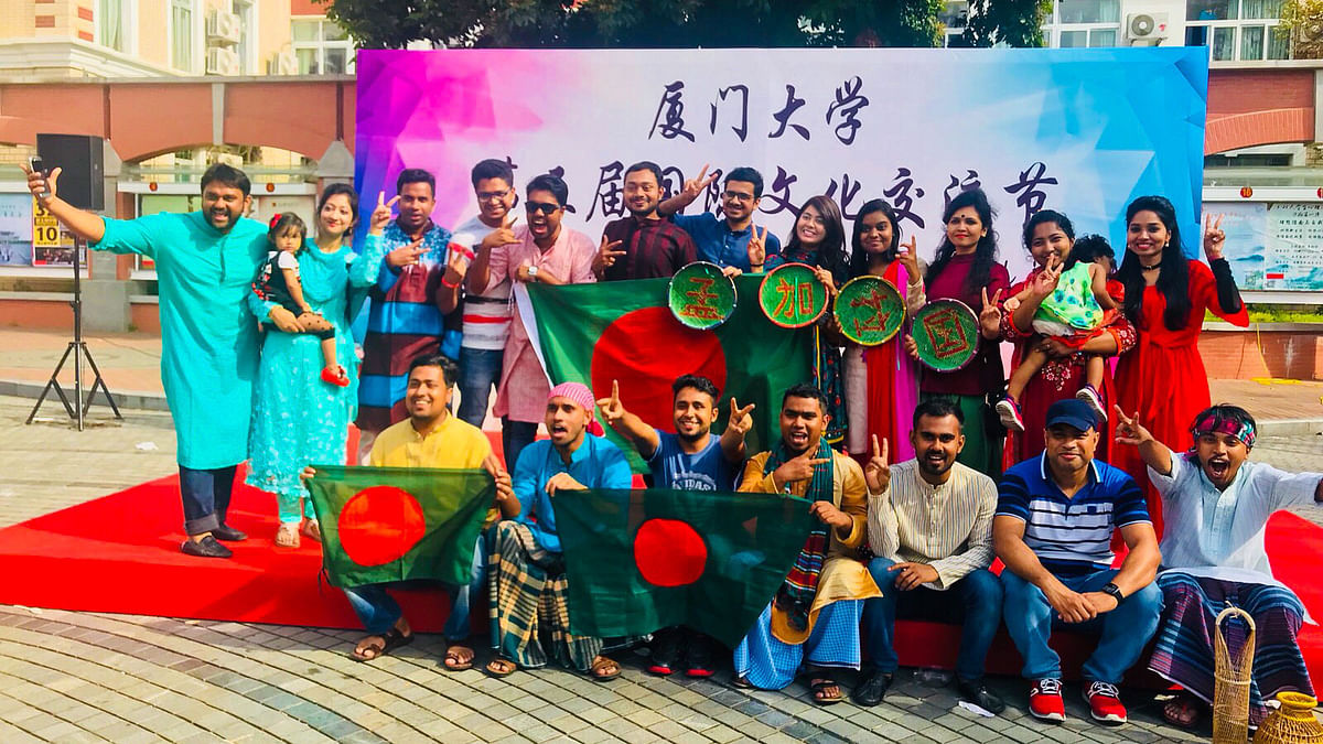 Bangladeshi students are photographed during the food festival. Photo: Collected