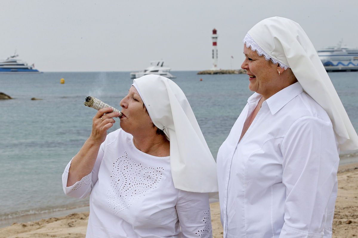 71st Cannes Film Festival - Cannes, France, 9 May 2018. Sister Kate and Sister Claire pose on the beach to promote the documentary film `Breaking Habits`? at the Cannes Film Festival.Photo: Reuters