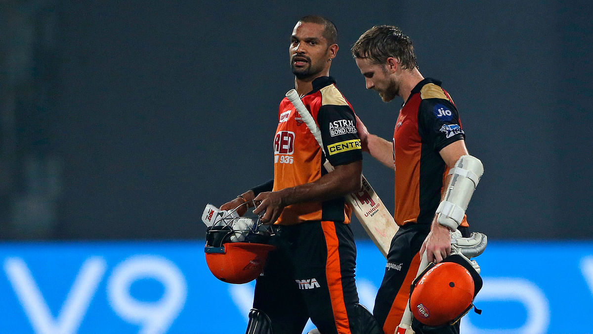 Sunrisers Hyderabad players Kane Williamson, right, and Shikhar Dhawan, walk off the field after beating Delhi Daredevils during VIVO IPL cricket T20 match in New Delhi, India on 10 May 2018. Photo: AP