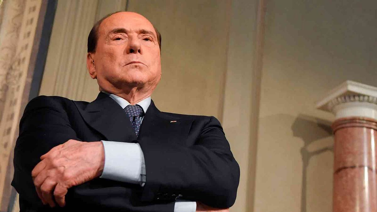 Silvio Berlusconi (R), leader of the right-wing party `Forza Italia` listens to Matteo Salvini (unseen), leader of the far-right party `Lega` speaking to the press after a meeting with Italian president Sergio Mattarella as part of consultations of political parties, on 7 May, 2018 at the Quirinale palace in Rome. Photo: AFP