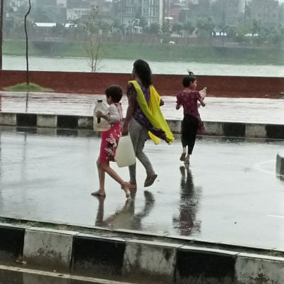 Children work and play in the Hatirjheel area of Dhaka. The photo was recently taken by Nusrat Nowrin