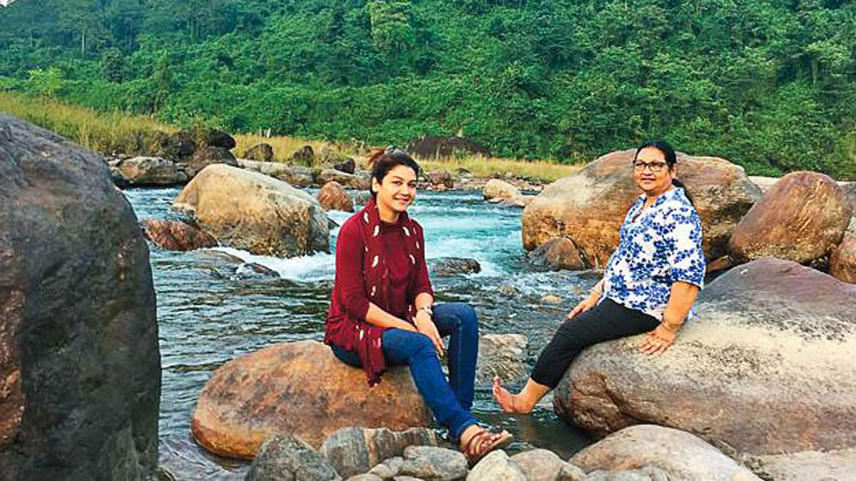 Jaya and her mother Rehana Masud enjoy the serenity of a sparkling stream. Photo: Collected
