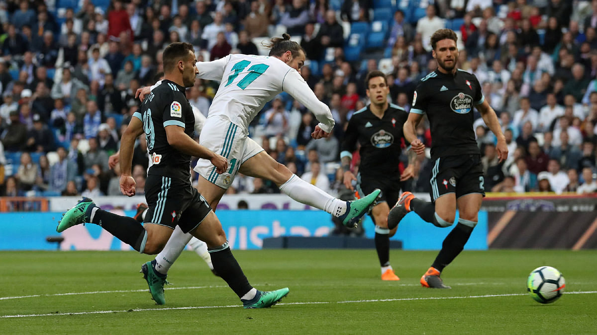 Real Madrid player Gareth Bale scores their first goal against Celta Vigo at Santiago Bernabeu, Madrid, Spain on 12 May 2018. Photo: Reuters