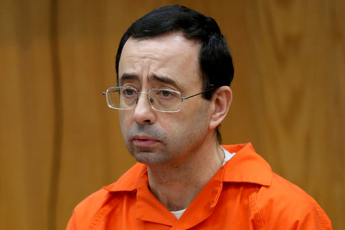 Larry Nassar, a former team USA Gymnastics doctor who pleaded guilty in November 2017 to sexual assault, listens to victims impact statements during his sentencing in the Eaton County Circuit Court in Charlotte, Michigan, US, 31 January 2018. Photo: Reuters