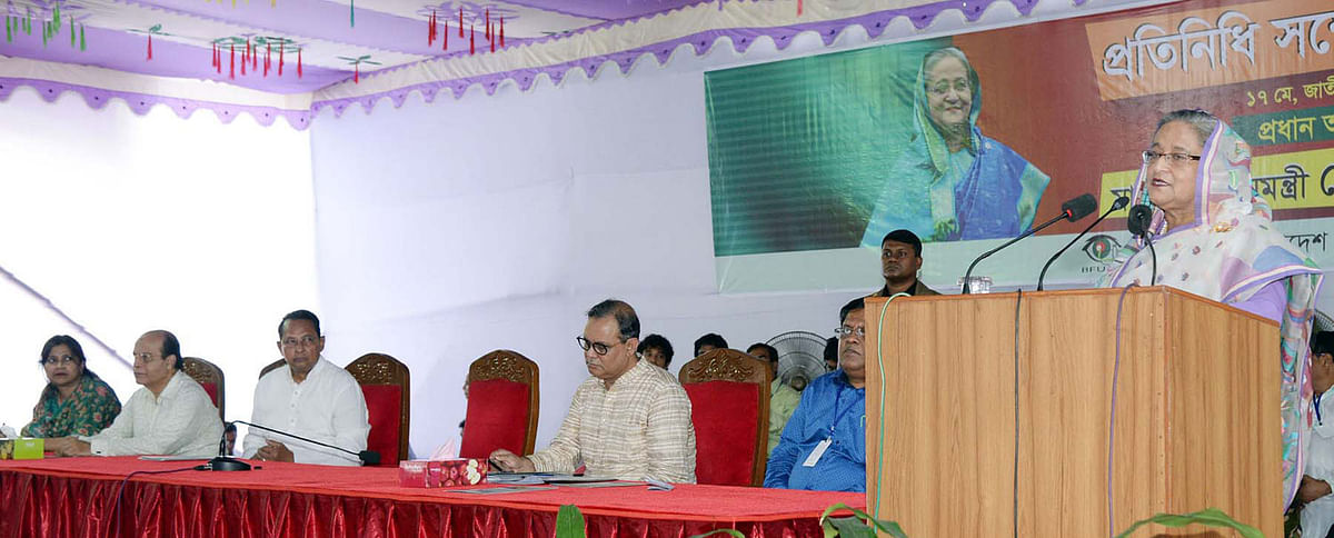 Prime minister Sheikh Hasina addresses the council of Bangladesh Federal Union of Journalists (BFUJ) at the National Press Club on Thursday. Photo: PID