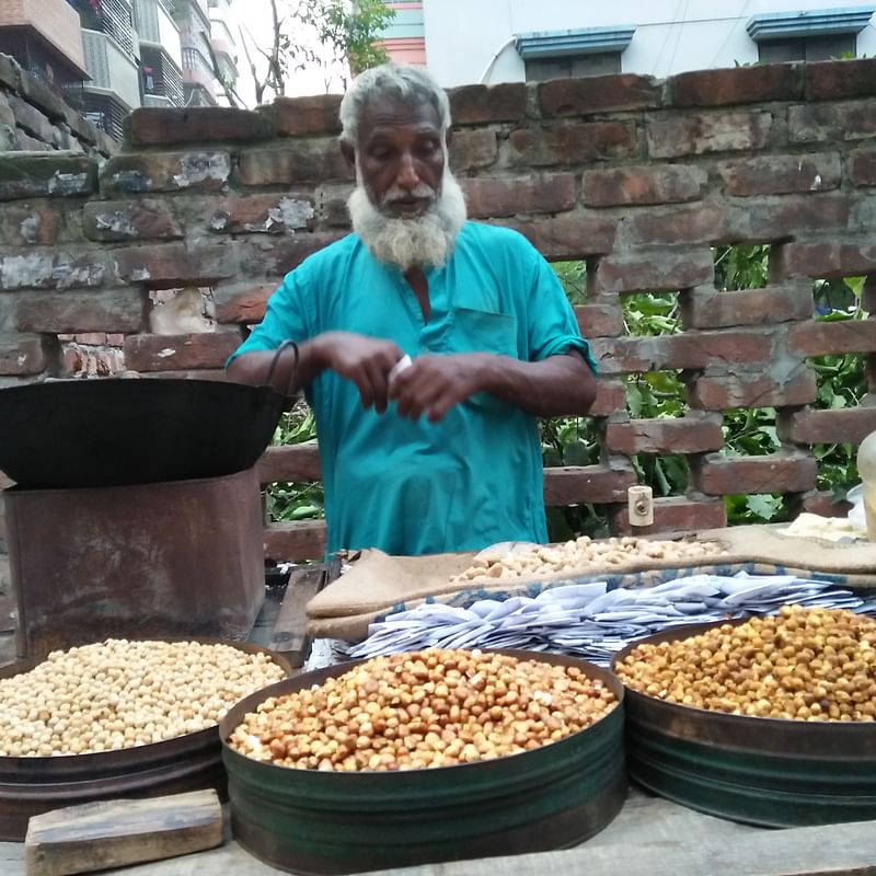 Asad Mia, a street vendor at Madhya Badda, Dhaka, depends on his own farming for Ramadan food items. Photo: Nusrat Nowrin