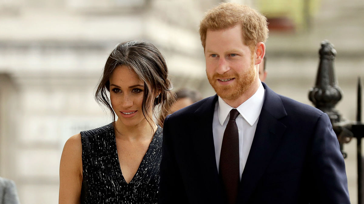Britain`s prince Harry and his fiancée Meghan Markle
