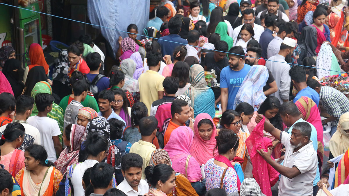 Customers in front of Chandi Chawk market in Dhaka. Photo: Sabrina Yesmin