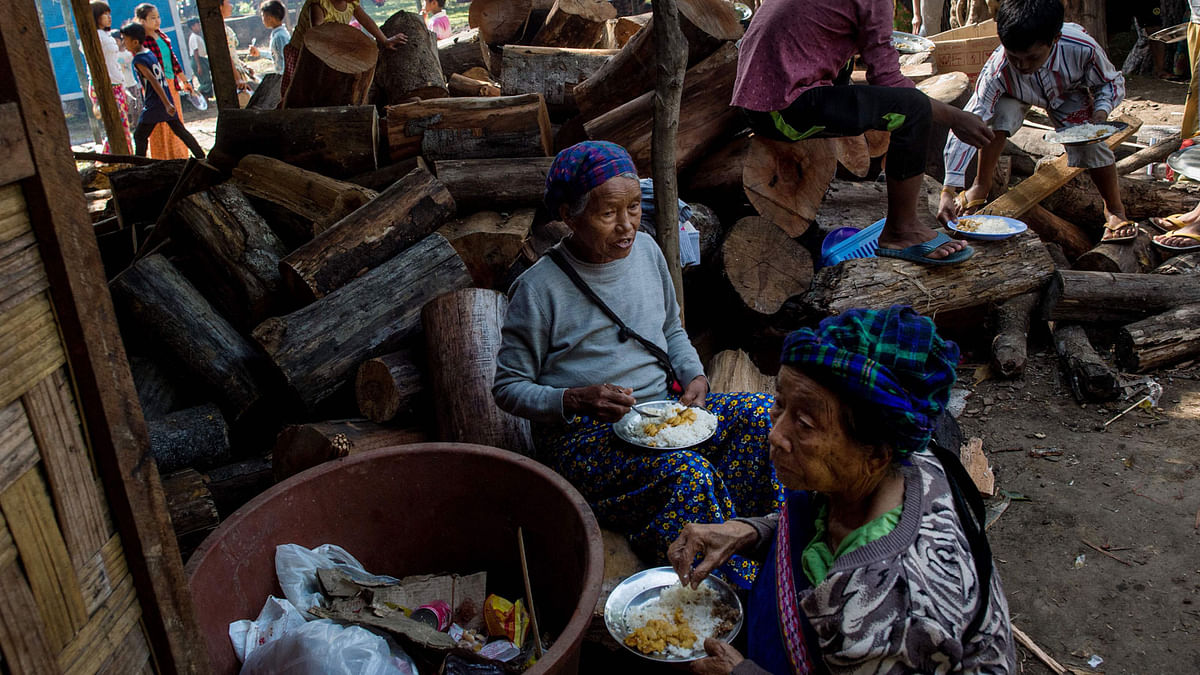 Kachin//This picture taken on May 11, 2018 shows internally displaced people in a church compound in Myitkyina after fleeing conflict between government troops and ethnic armed group in Kachin state. Often called the `forgotten war`, the Kachin conflict is a messy struggle over autonomy, ethnic identity, drugs, jade and other natural resources, between the Kachin Independence Army (KIA) and the Myanmar state. AFP