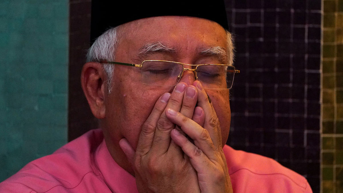 Malaysia’s former Prime Minister Najib Razak prays before he attends the United Malays National Organisation (UMNO) 72th anniversary celebrations in Kuala Lumpur, Malaysia on 11 May 2018. Photo: Reuters