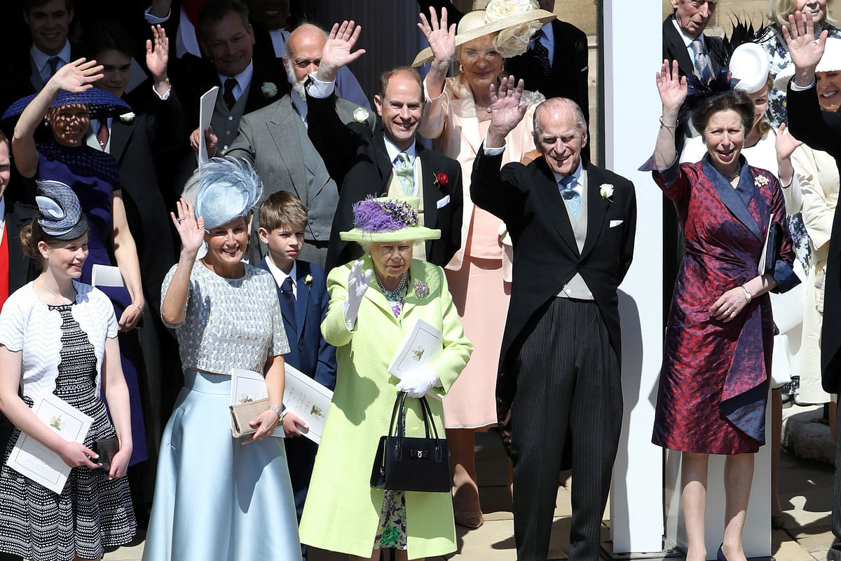 Queen Elizabeth II and other members of the royal family wave after the wedding of Prince Harry and Meghan Markle at St George`s Chapel in Windsor Castle in Windsor, Britain, 19 May, 2018. Photo: Reuters