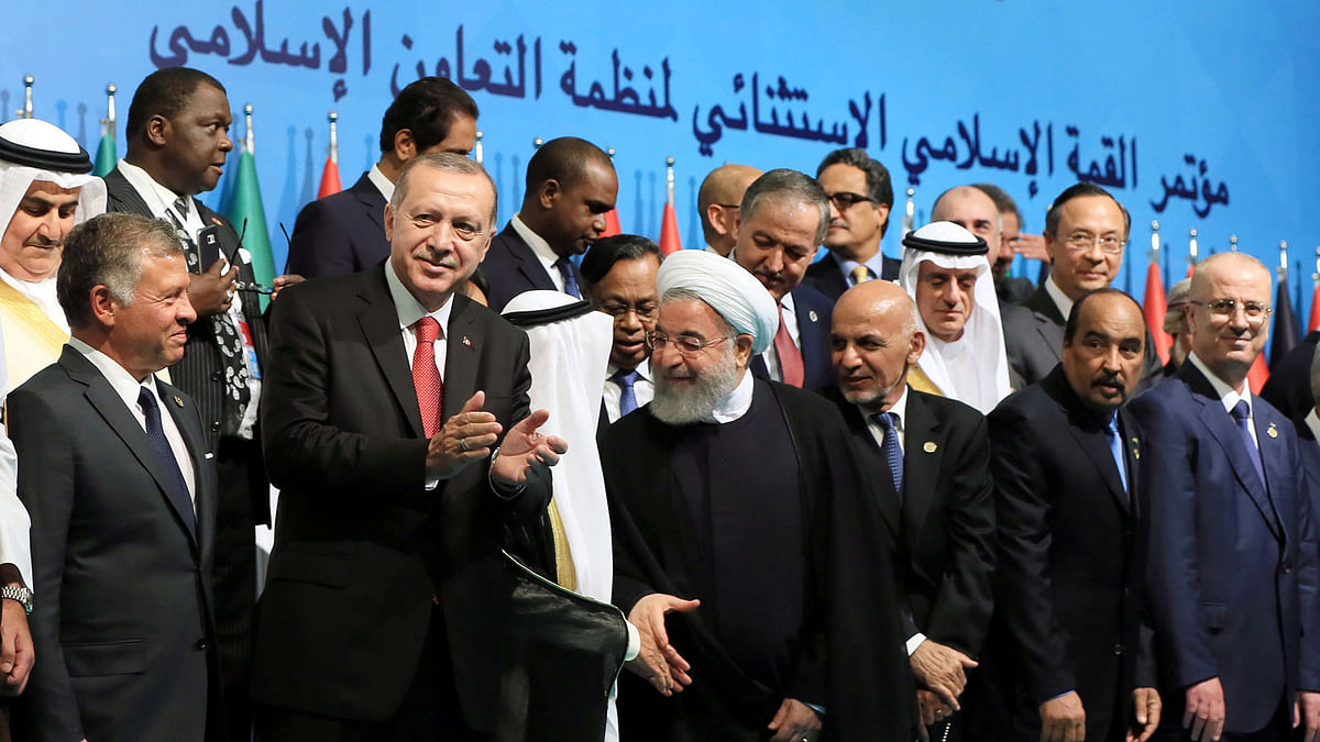 Turkish president Tayyip Erdogan poses with leaders and representatives of the Organisation of Islamic Cooperation (OIC) member states for a group photo during an extraordinary meeting in Istanbul, Turkey on 18 May 2018. Photo: Reuters