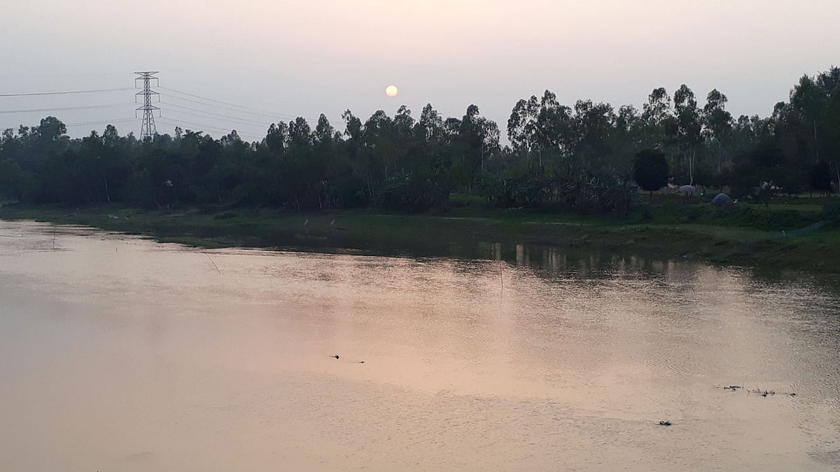 A view of sunset at Phuljor river in Raiganj of Sirajganj clicked on 18 May. Photo: Sajedul Alam