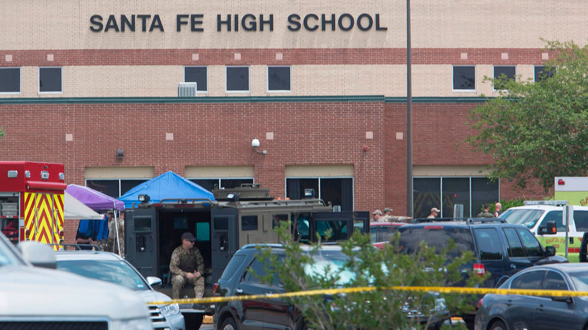 Emergency crews gather in the parking lot of Santa Fe High School where at least ten people were killed on 18 May 2018 in Santa Fe, Texas. Photo: AFP