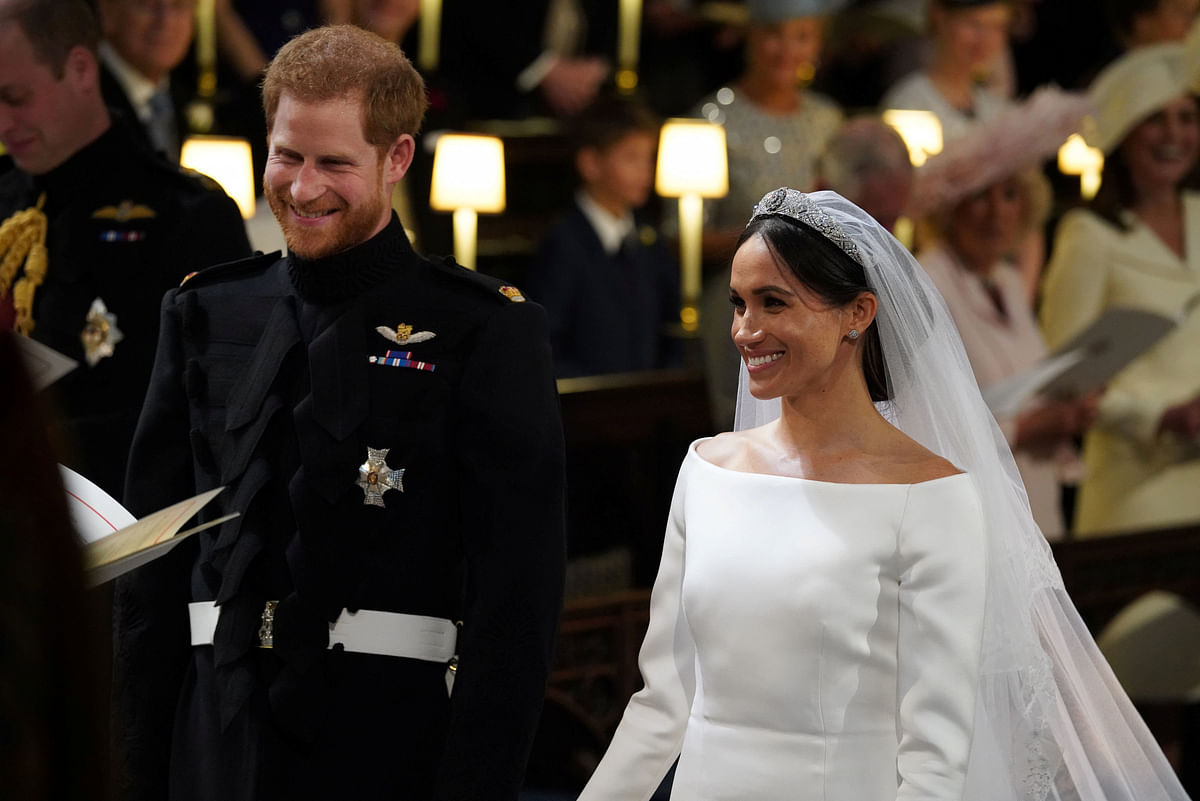 Prince Harry and Meghan Markle in St George`s Chapel at Windsor Castle during their wedding in Windsor, Britain, 19 May, 2018. Photo: Reuters