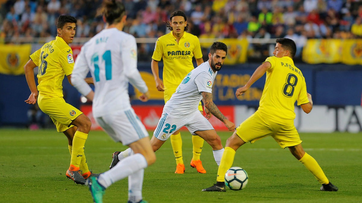 Real Madrid’s Isco in action with Villarreal’s Pablo Fornals at Estadio de la Ceramica, Villarreal, Spain on 19 May 2018. Photo: Reuters