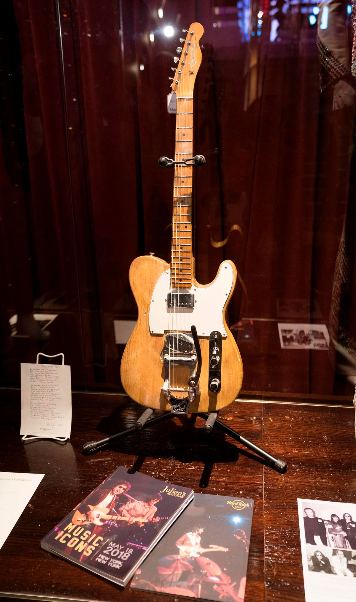 A Bob Dylan/Robbie Robertson 1965 Fender Telecaster guitar is displayed along with other items during a media preview on 14 May 2018 in New York. Photo: AFP