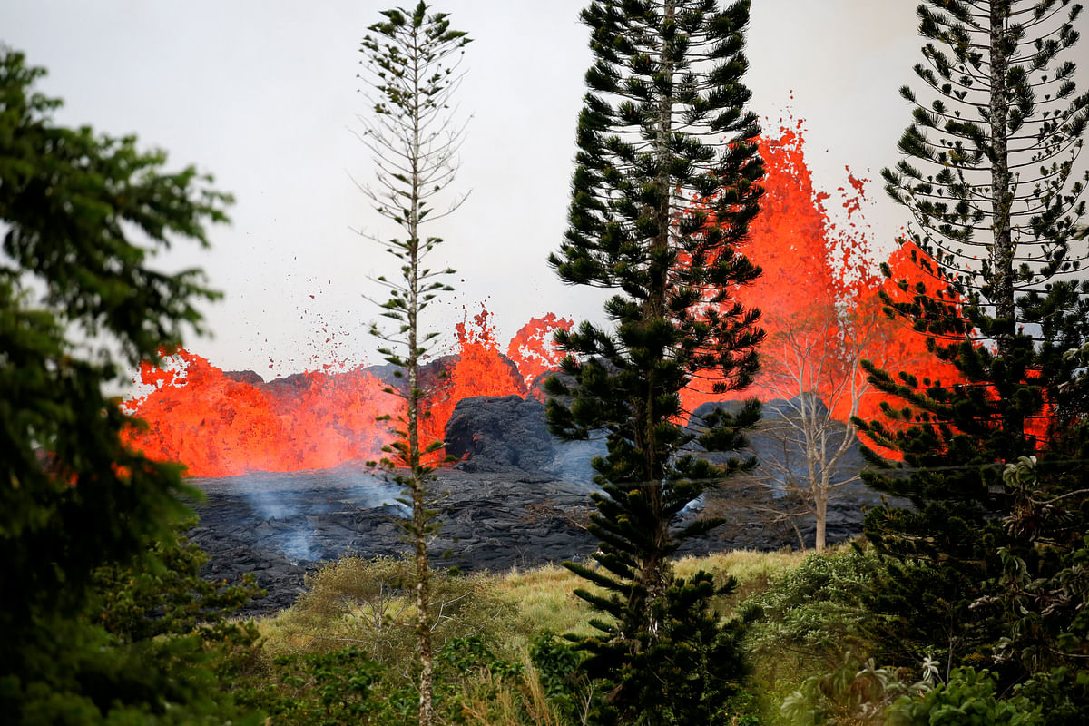 Lava erupts on the outskirts of Pahoa during ongoing eruptions of the Kilauea Volcano in Hawaii, US on 19 May. Photo: Reuters