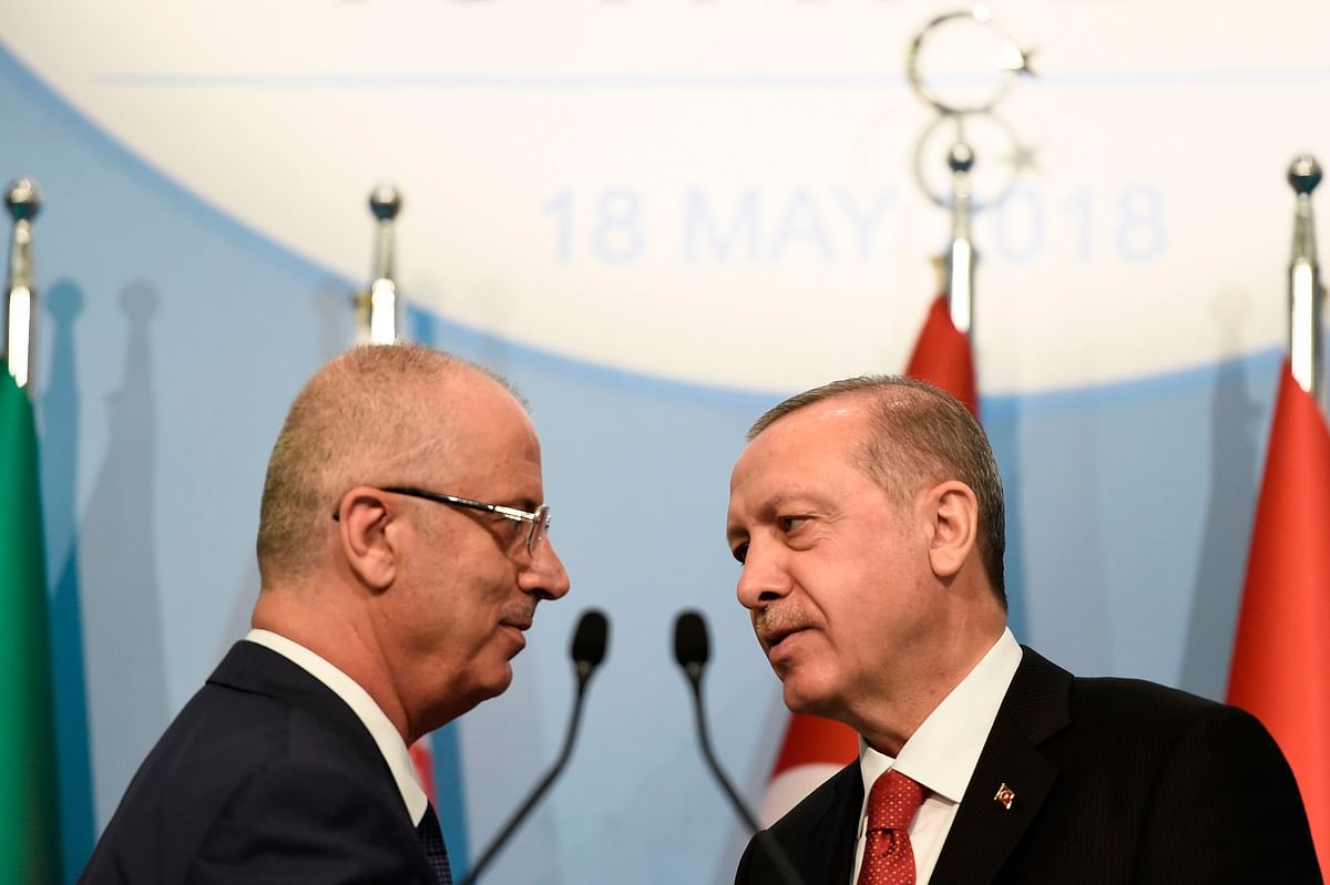 Palestinian prime minister Rami Al Hamdallah (L) and Turkish president Recep Tayyip Erdogan attend a press conference at the extraordinary summit of the Organisation of Islamic Cooperation (OIC) in Istanbul on 18 May 2018. Photo: AFP  Erdogan to hold controversial election rally in Bosnia