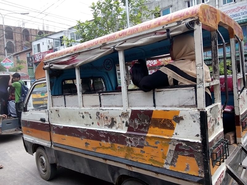 In this photo taken on 20 May, a human hauler, popularly known as leguna, is seen waiting for passenger at Farmgate area in the capital. Photo: Mushfique Wadud