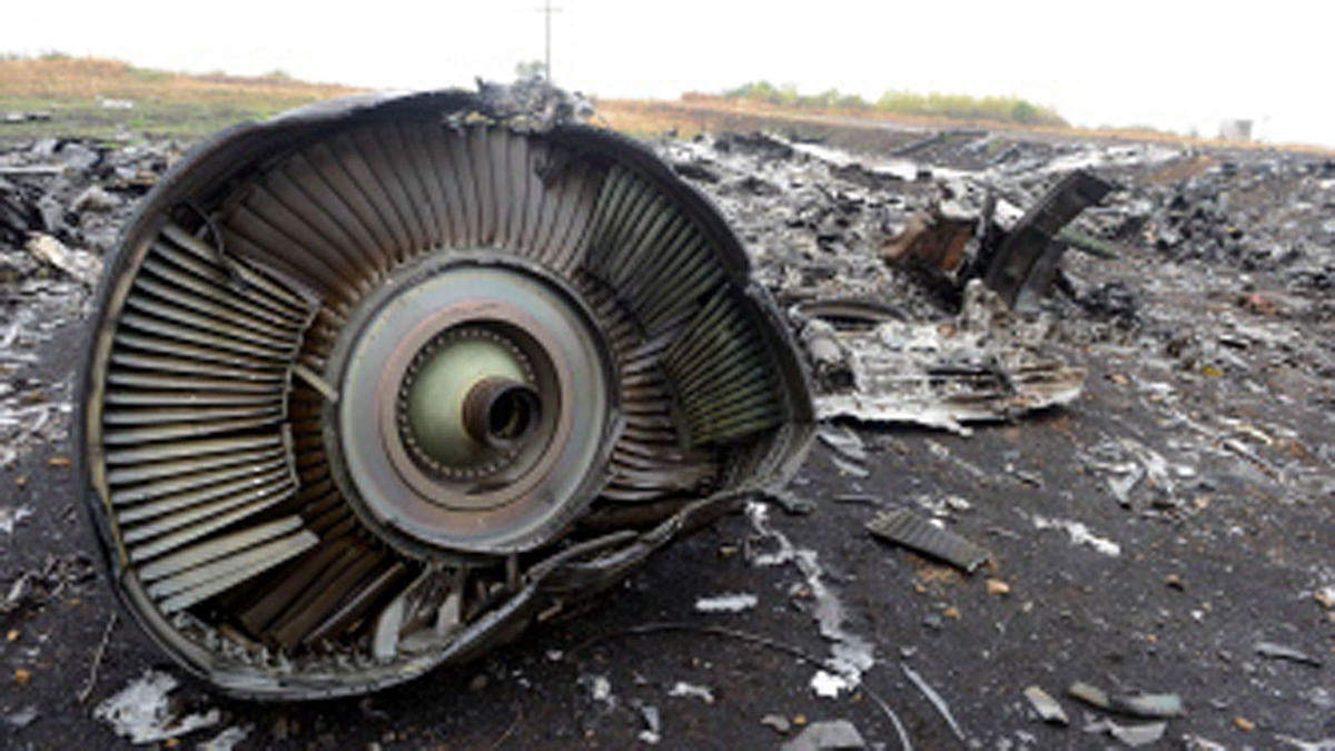 In this file photo taken on September 09, 2014 shows part of the Malaysia Airlines Flight MH17 at the crash site in the village of Hrabove (Grabovo), some 80km east of Donetsk. Photo : AFP