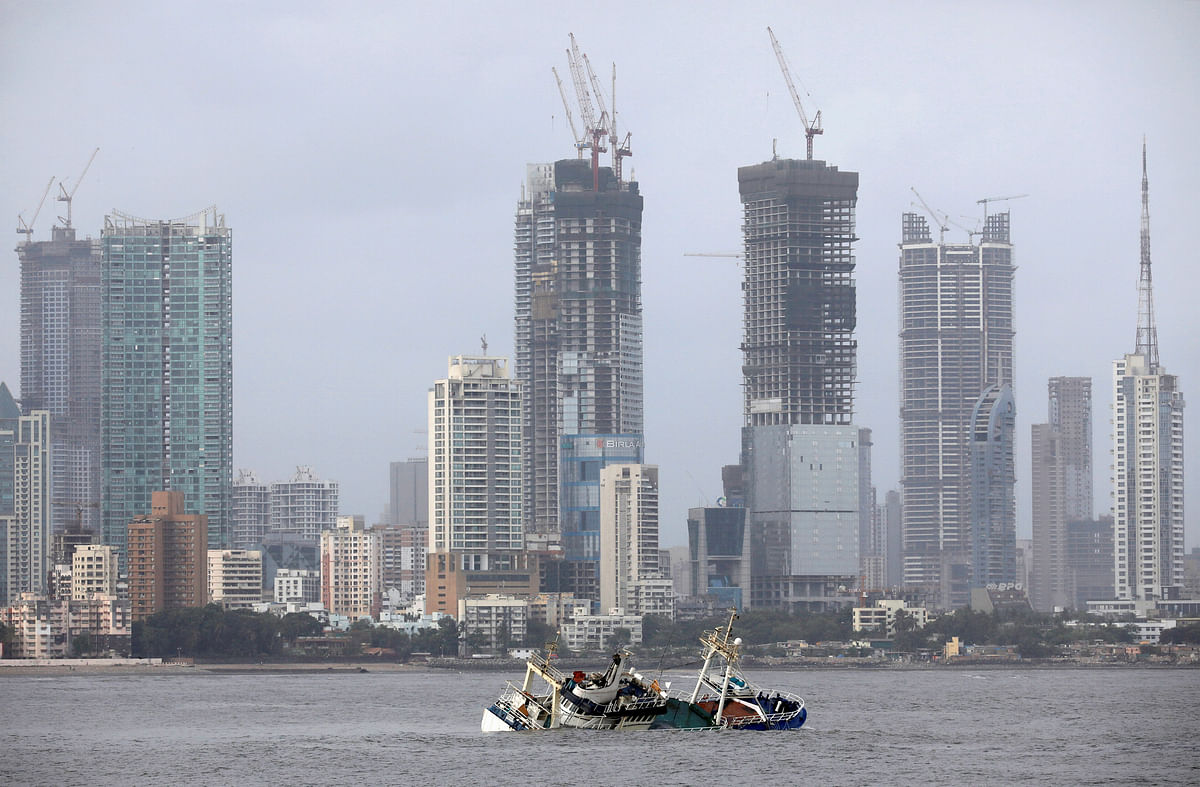 Ark Deck Bar, a floating restaurant is seen capsized in the Arabain Sea off the coast of Mumbai, India on 26 May. Photo: Reuters