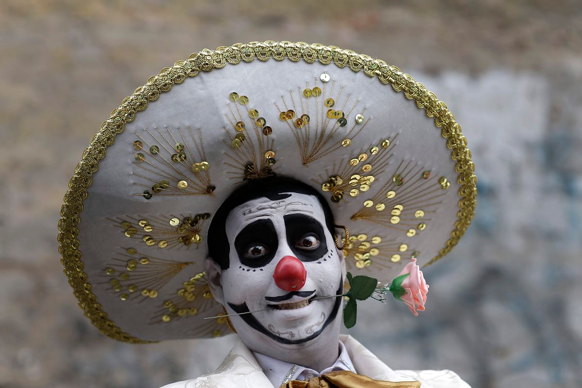 A clown smiles before celebrating Peruvian Clown Day in Lima, Peru on 25 May. Photo: AP