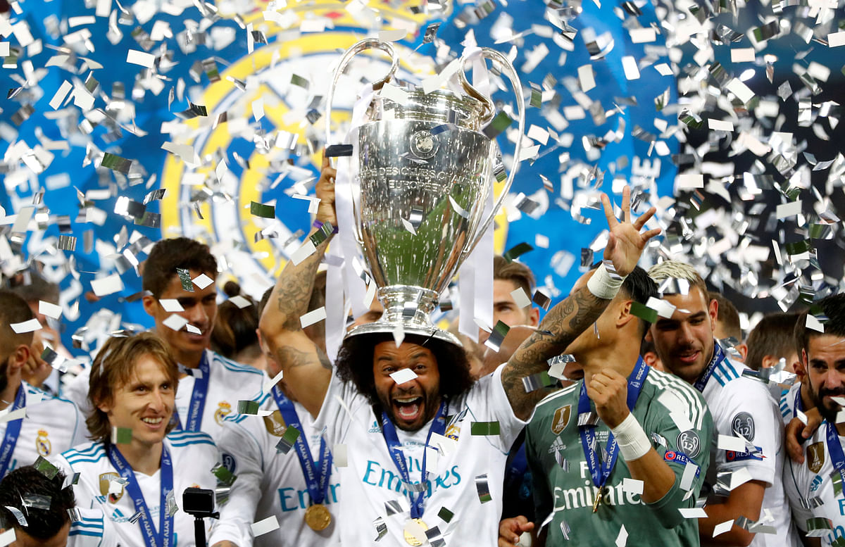 Real Madrid`s Marcelo celebrates with the trophy. Photo: Reuters