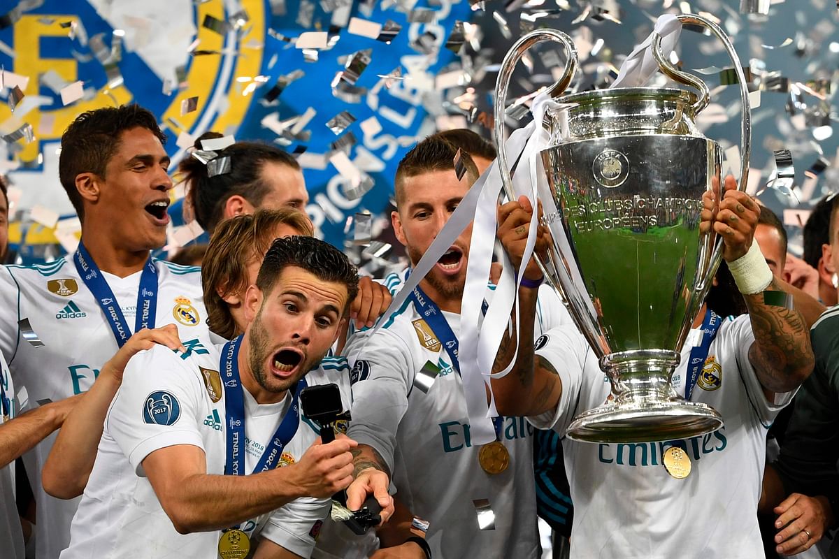 Real Madrid`s Spanish defender Nacho Fernandez direct the selfie stick as Real Madrid players celebrate winning the UEFA Champions League final at the Olympic Stadium in Kiev, Ukraine on 26 May 2018. Photo: AFP