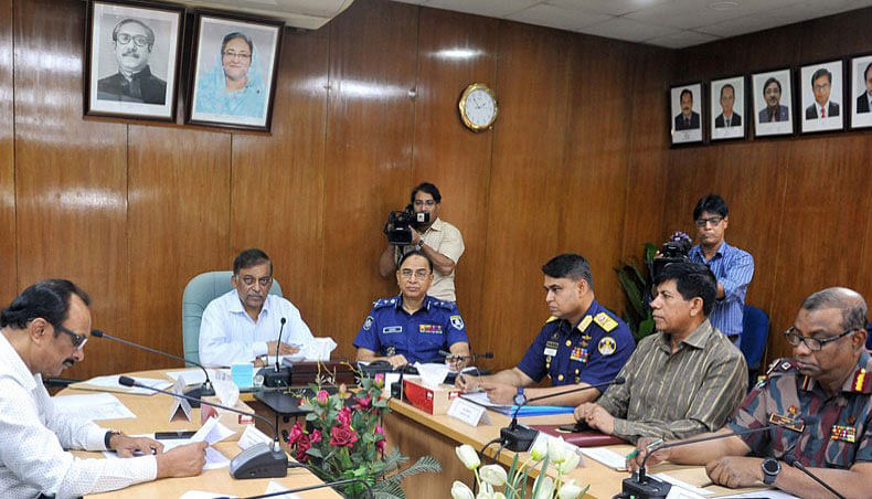 Home minister Asaduzzman Khan Kamal chairs a meeting over law and order situation ahead of Eid ul-Fitr, at his office in Bangladesh Secretariat on Sunday. Photo: PID photo